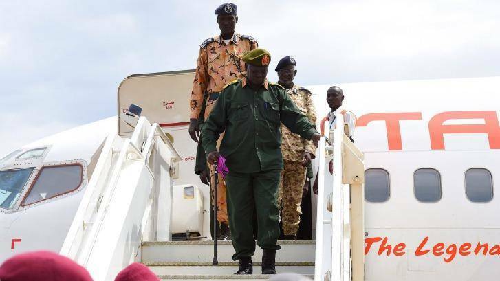 Chief of General Staff Simon Gatwech Dual (front center, with walking stick) arrives at Juba Airport from Gambella in an important step in bringing about the return of Riek Machar. Photo: Kate Geraghty 