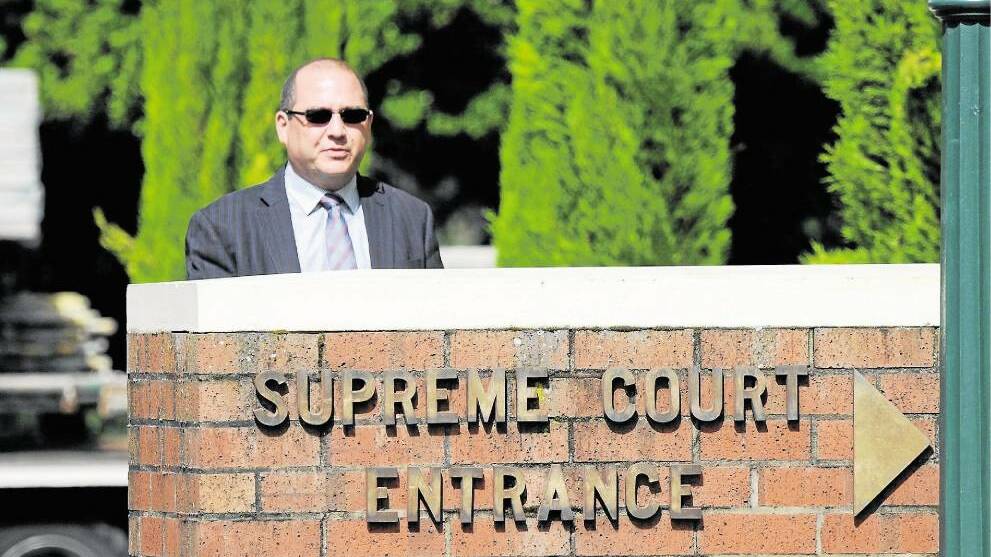 Adrian Hall outside the Supreme Court in Launceston during his stealing trial last year.