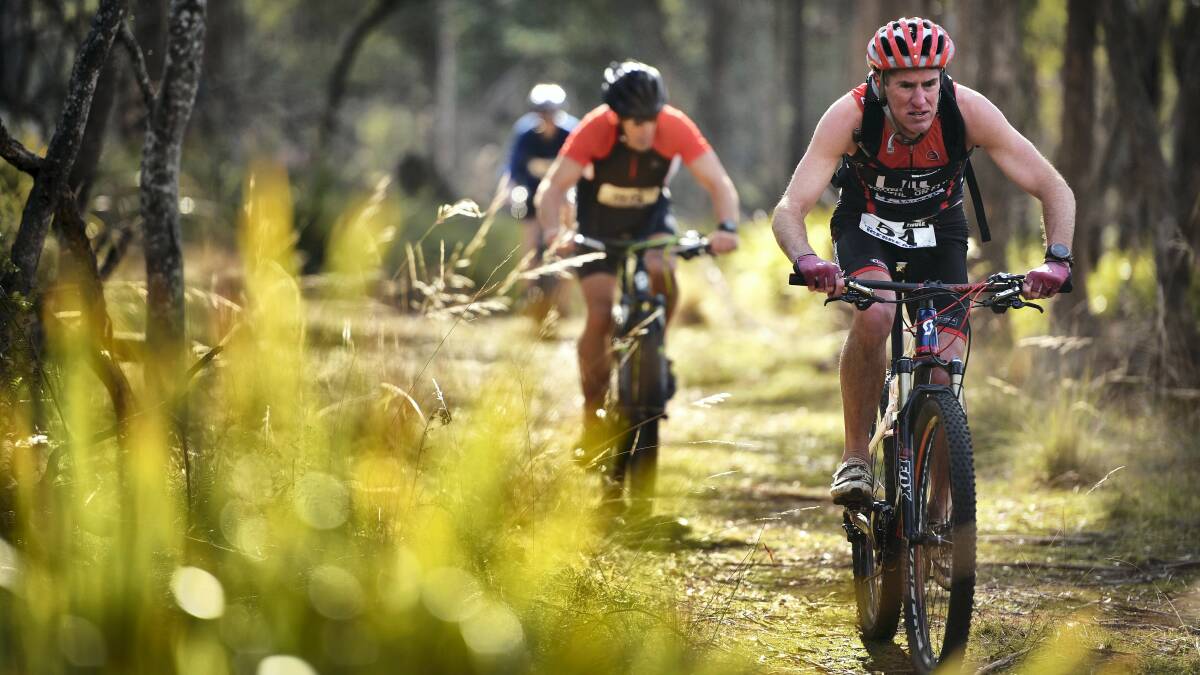 Veteran male competitor Rob Youl leads the pack in the bike leg of the Icebreaker Challenge. Pictures: SCOTT GELSTON
