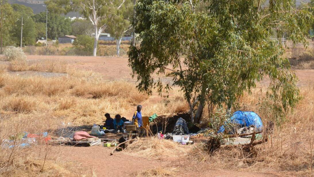 Makeshift camp: riverbed dwellers sit in the riverbed near the Alma Street crossing. When water is in the river it flows to the city's water supply, Lake Moondarra.