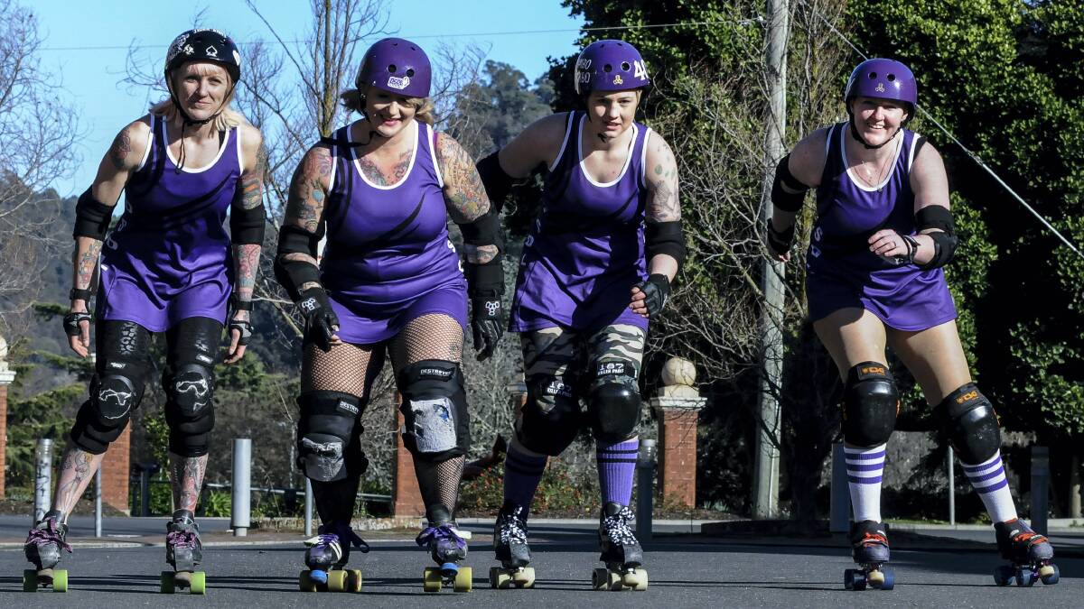 Launceston's Devil State Derby League members Valentine Vandetta, Cruella de Wheelz, Rambo Sambo and Bloodnut Betty will be out to roll Hobart's Convict City Rollers next month. Picture: NEIL RICHARDSON
