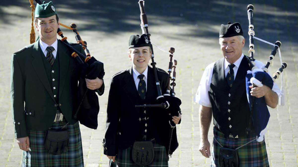 St Andrews Caledonian Pipe Band members John Ralph, Sally-Anne Richter and Geoff Watson are off to Europe. Picture: MARK JESSER

