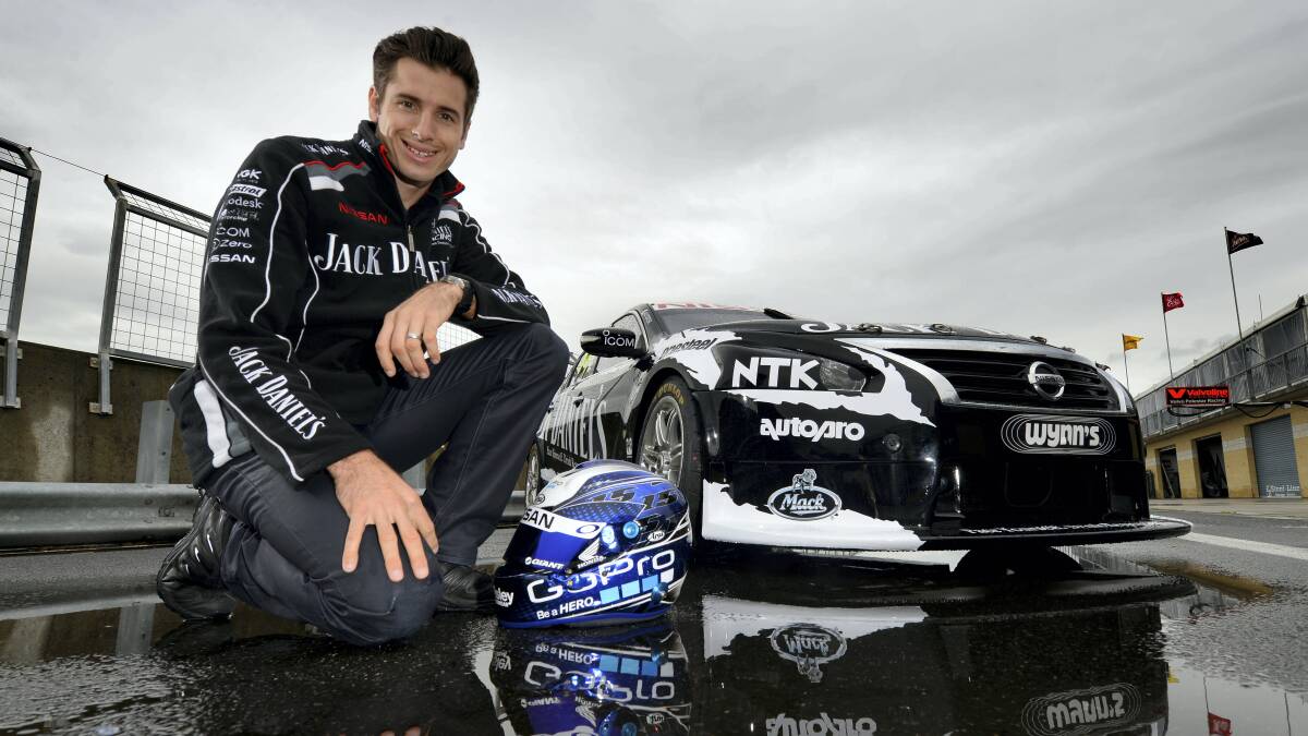 Jack Daniels Racing Team's Rick Kelly  watches the rain fall at Symmons Plains yesterday ahead of  the opening practice sessions today at the track. Picture: MARK JESSER.

 