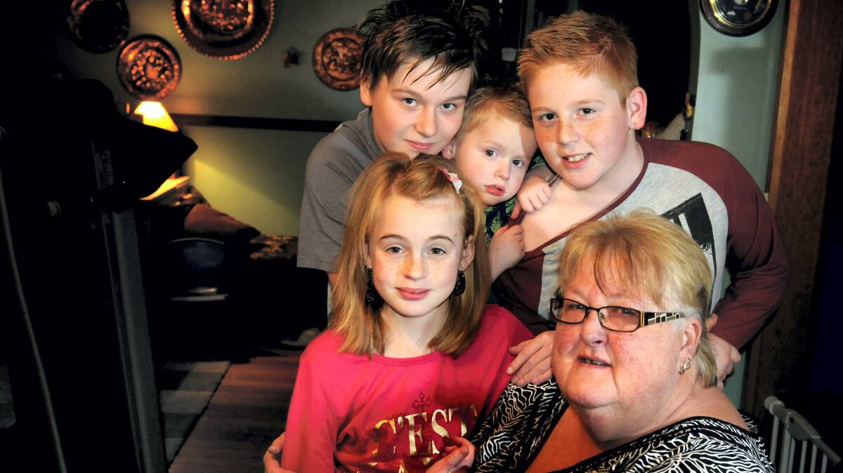 Mother of murdered woman Jessica Kupsch, Donna Kupsch, with her grandchildren Grace Holton, 10, Jack Holton, 13, Kacey Holton, 2, and Alex Holton, 11, during a fund-raiser. Picture: GEOFF ROBSON