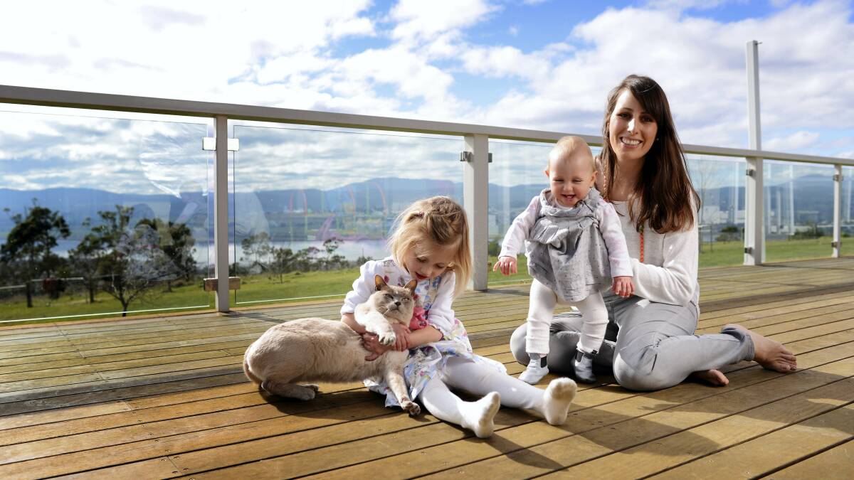 Launceston’s Perdita Finney with her daughters, Eliza, 4, and 11-month-old Amalia, who were born at 26 and 29 weeks.  Picture: SCOTT GELSTON