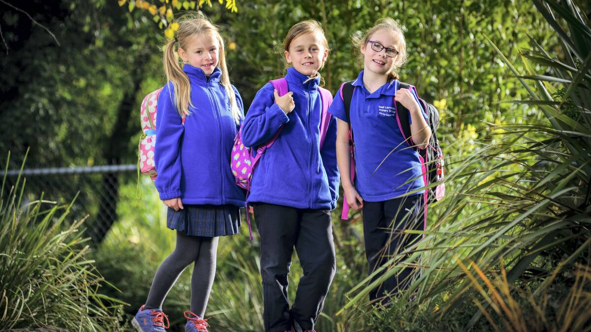 West Launceston Primary School grade 2 pupils Erin Coull, Gabby Pyka and Claire Alexander are ready for walk to school day. Picture: PHILLIP BIGGS