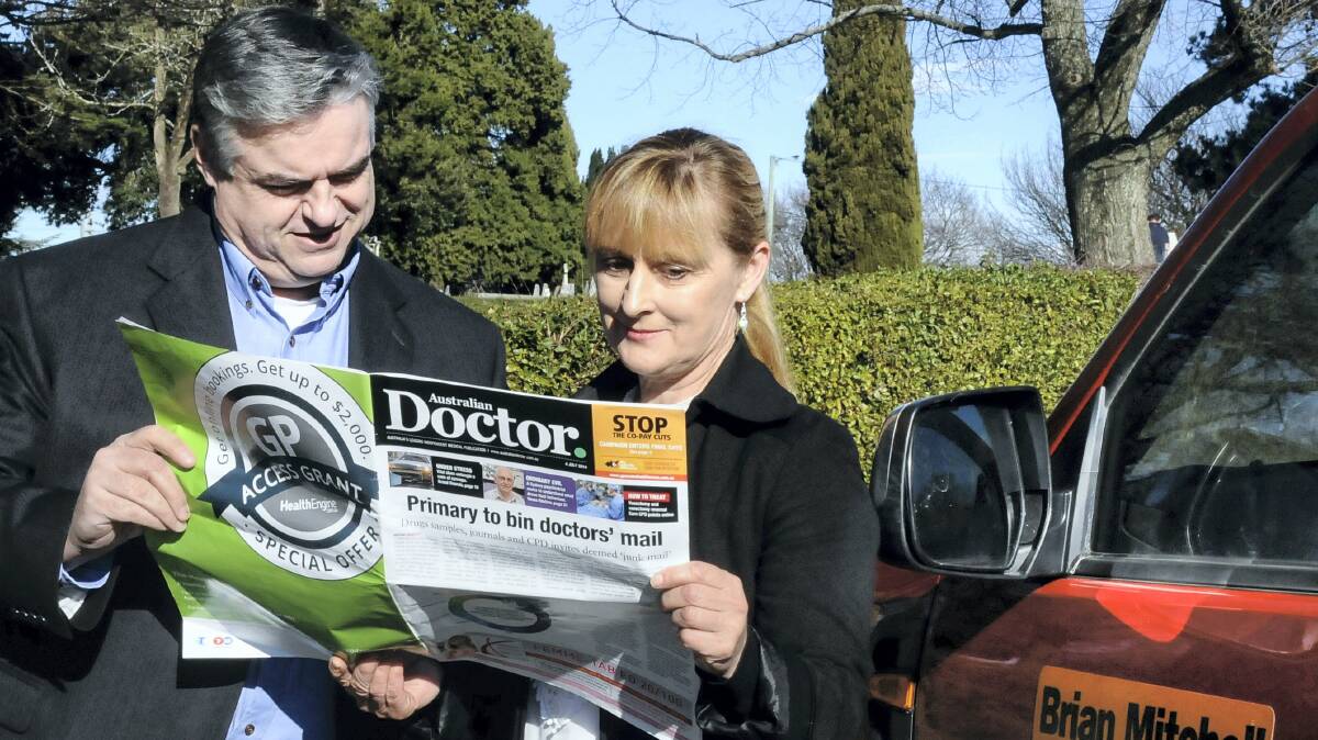 Labor candidate for Lyons Brian Mitchell and Perth general practitioner Tatiana Petrovsky discussing health issues at Longford. Picture: NEIL RICHARDSON