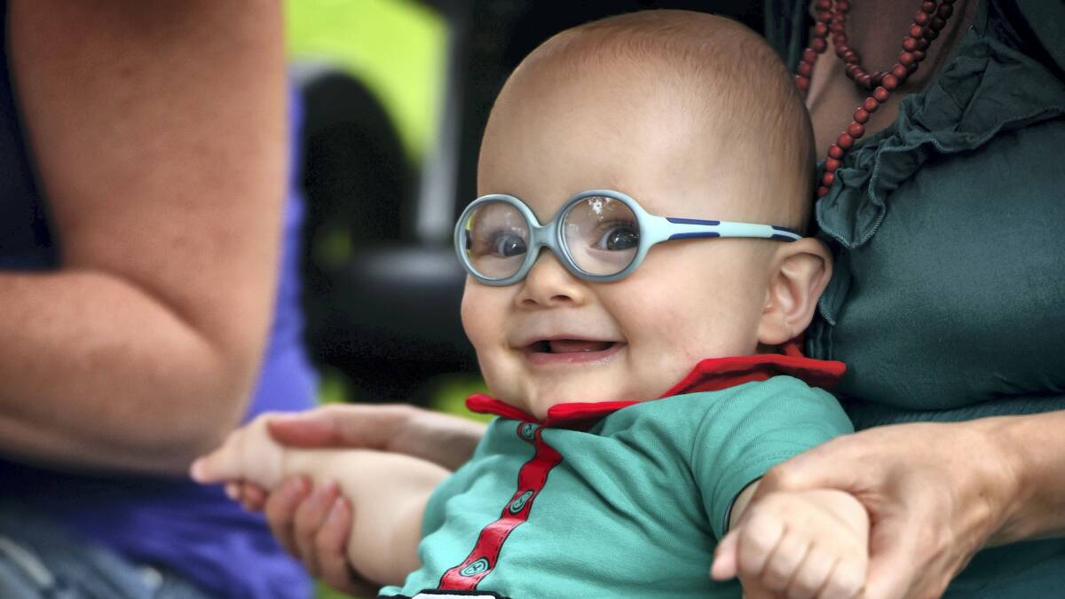 Seven-month-old Alexander Chong, of Evandale, at the CHAT Christmas party in City Park.  Picture: SCOTT GELSTON
