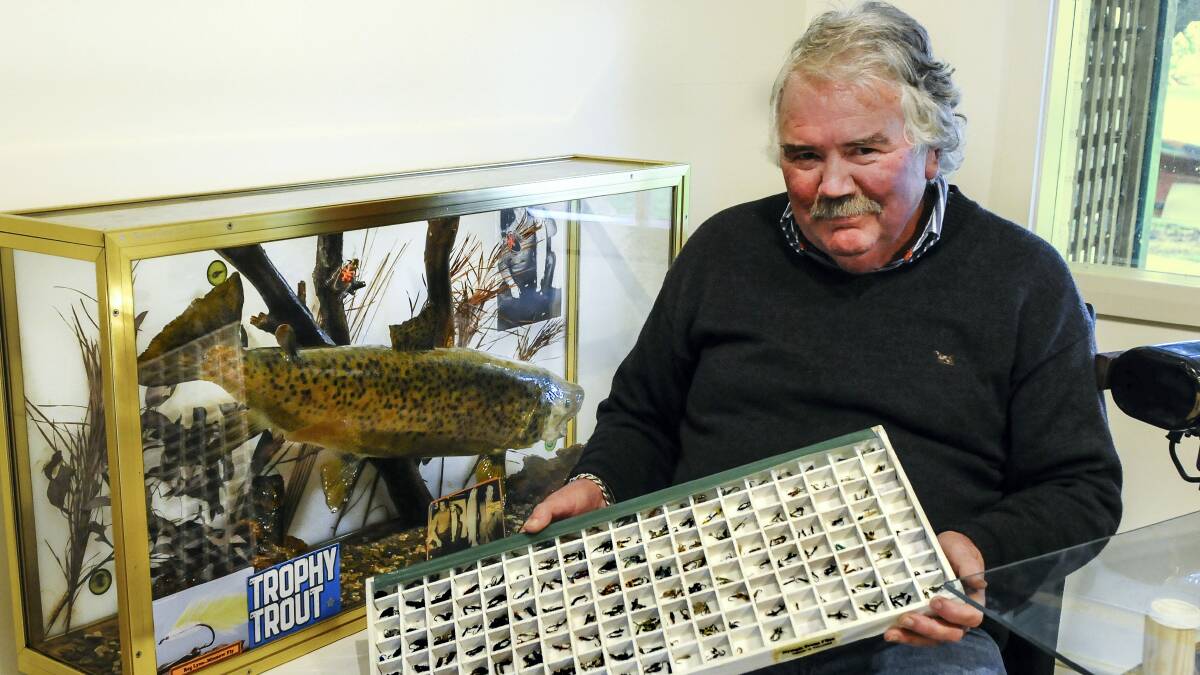 Australian Fly Fishing Museum volunteer co-ordinator Brad Gawne with a collection of lures. Picture: NEIL RICHARDSON
