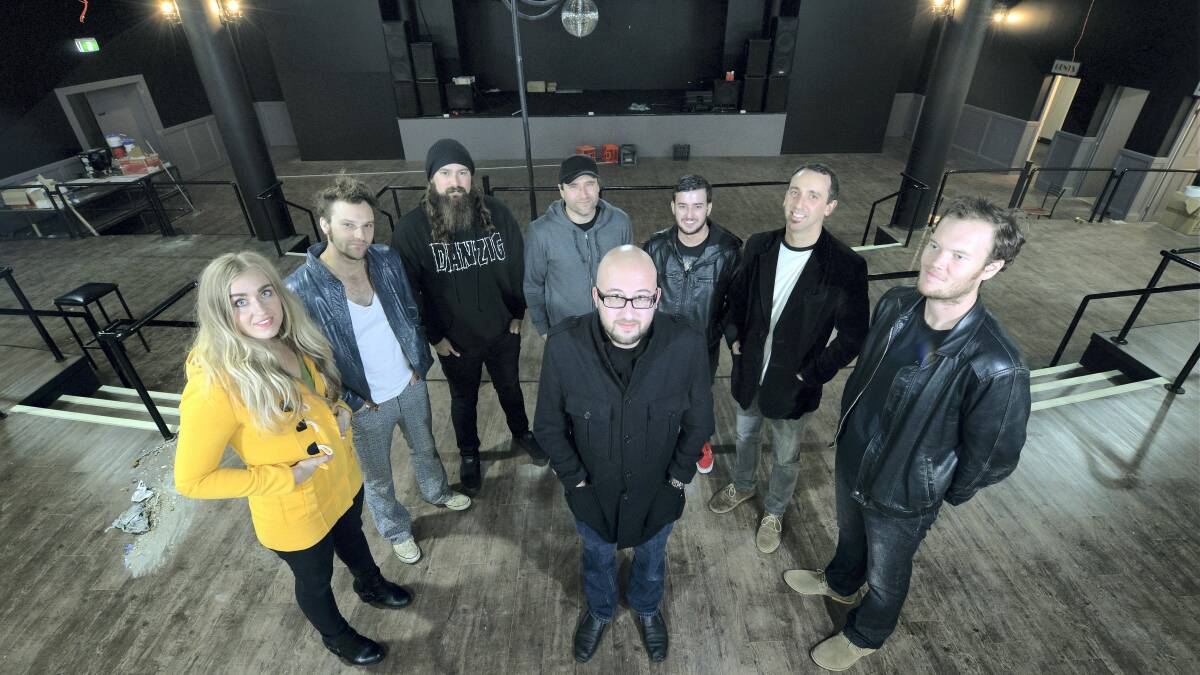 Launceston musicians Chris Jackson, Summer Edmunds, Lucas Tolputt, Rory Prins, booking agent Brad Harbeck, J. Robert Youngtown, Seth David and Sam Locke in the newly renovated Club 54, which will reopen next month. Picture: MARK JESSER
