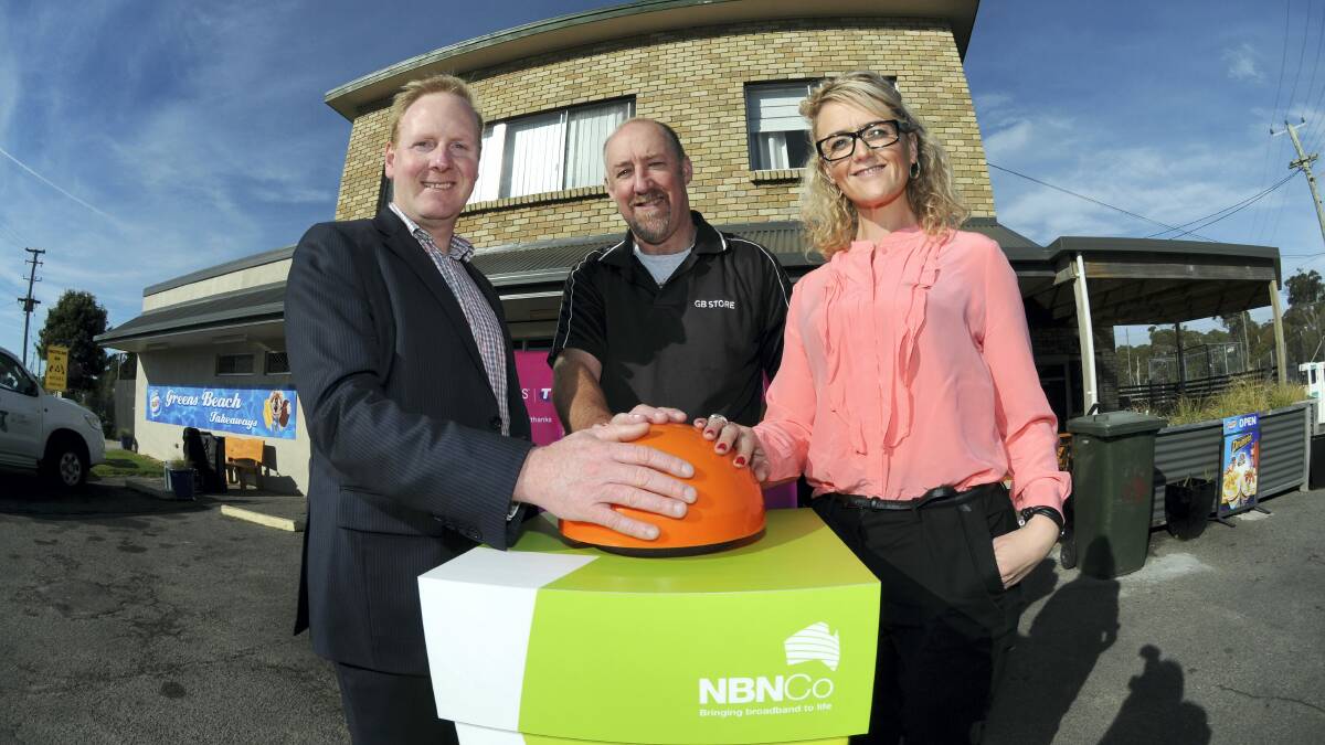 Telstra Country Wide Area general manager Michael Patterson, Greens Beach Shop owner Neville Stewart  and NBN Co's community relations manager for Tasmania Lalla MacKenzie.  Picture: PAUL SCAMBLER