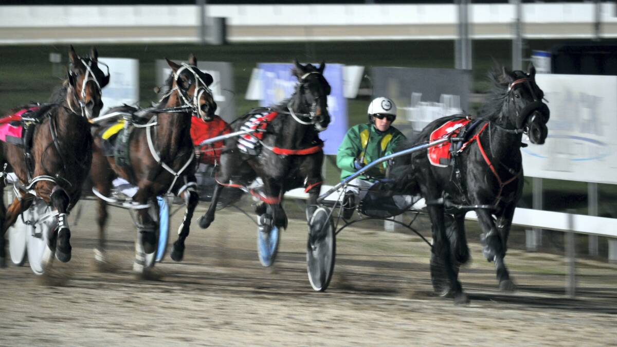 Blackjackhanover (inside), driven by Natalee Emery, holds his rivals at bay for a breakthrough win at Mowbray last night. Pictures: GREG MANSFIELD