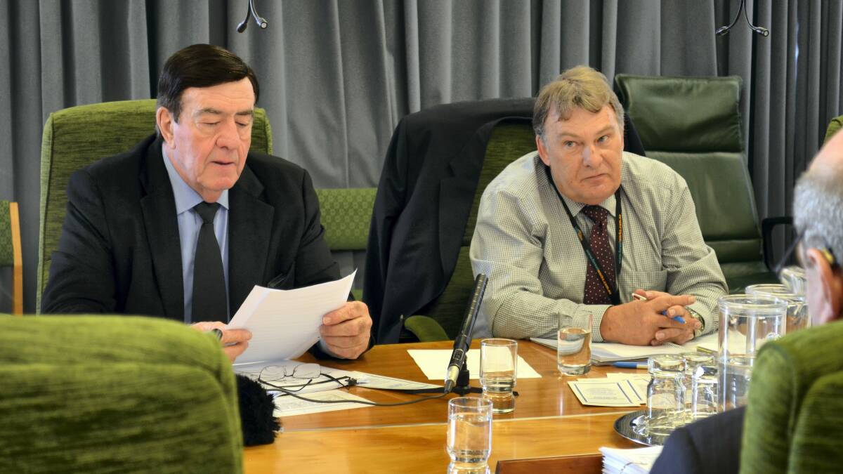 Forest Industries Association of Tasmania chairman Glenn Britton and chief executive Terry Edwards during evidence at the Triabunna woodchip mill inquiry. Picture: GEORGIE BURGESS