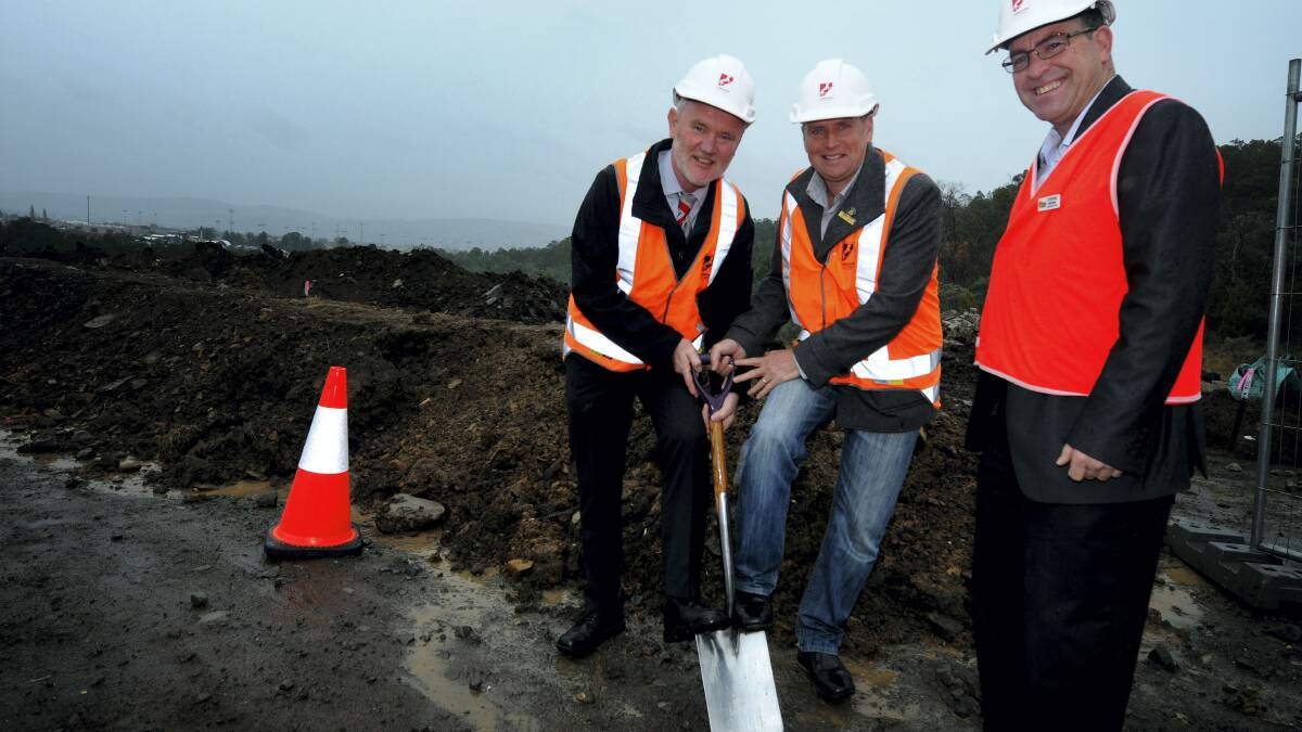 Turning the first sod for the tip shop at the Mowbray tip are Launceston City Mayor Albert van Zetten, Deputy Mayor Jeremy Ball and City Mission chief executive Stephen Brown. Picture: GEOFF ROBSON