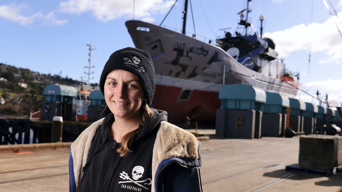Steve Irwin ship manager Pia Klemp with the vessel in dry dock at Kings Wharf in Launceston. Picture: SCOTT GELSTON
