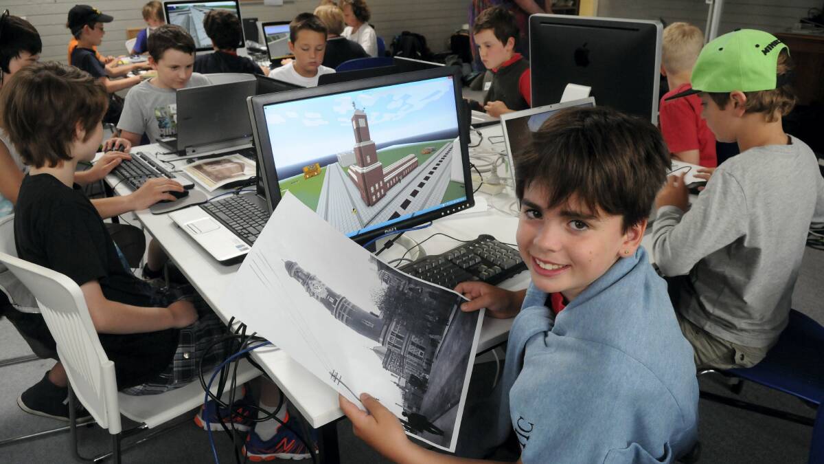 Working on the Launceston Post Office building is Tully Mateos-King, 10, of Launceston. Picture: Paul Scambler