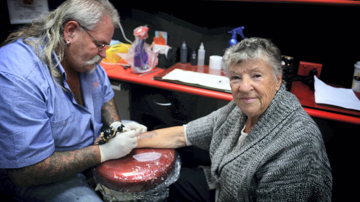 Scottsdale's Margaret Caulfield, 77, getting her tattoo from Tubby Quinn at the Tattoo Studio at Mowbray.