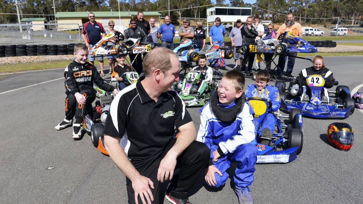 Launceston Kart Club’s  Jonathan Males  revs up fellow club member  Jake Delphin about the coming  state titles,