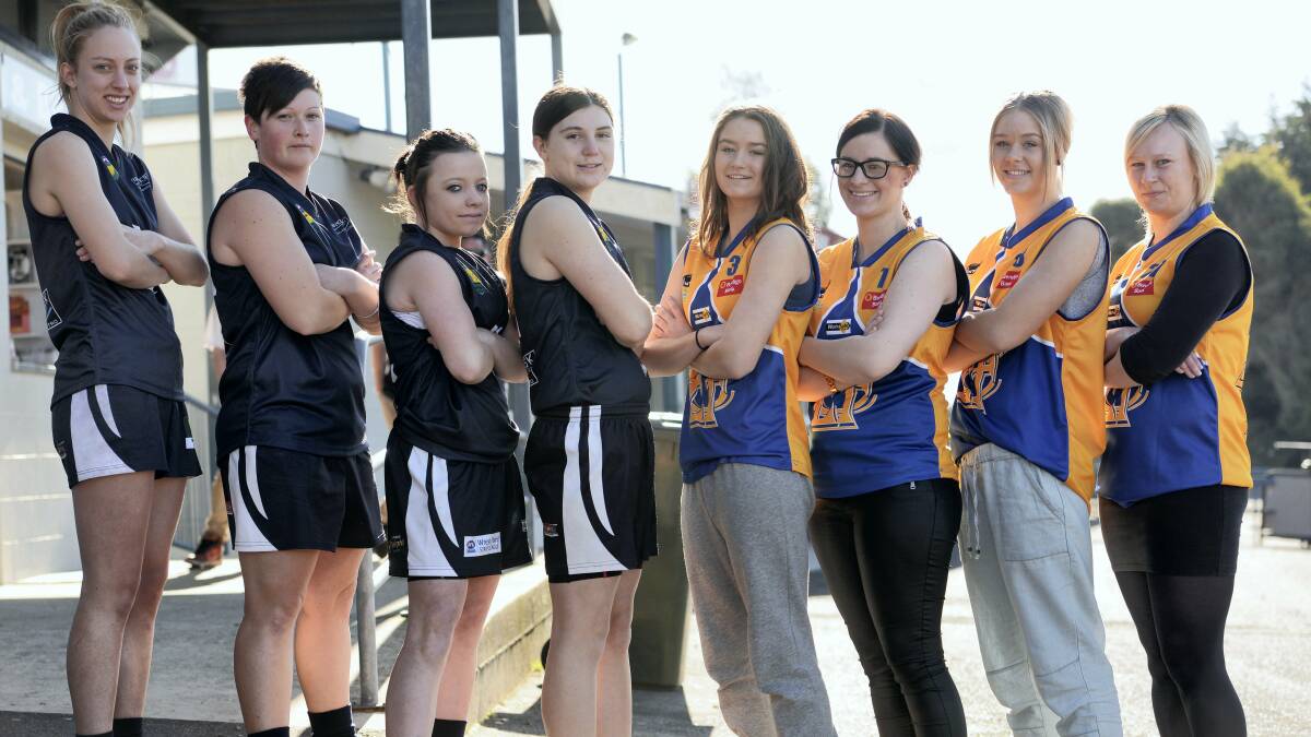 Launceston's Katherine Johnson, Jenna Cousens, Courtney Saunders and Hayley White support Evandale's Maddison Hill, Kristy Perry, Georgia Hill and Kristy Johnstone in their push for a women's football side. 