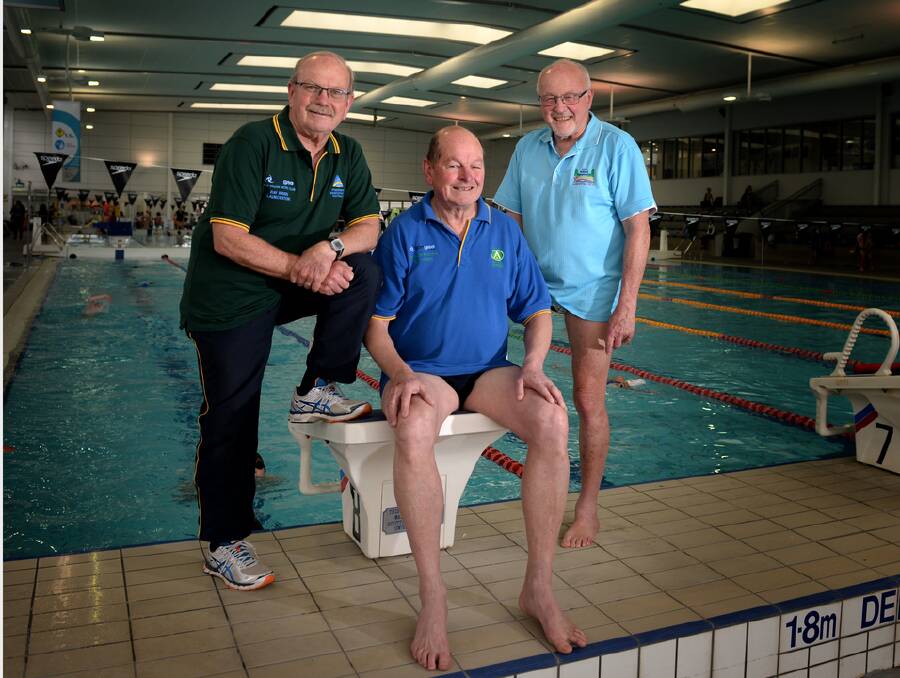 Members of the Launceston Masters Swimming Club; Ray Brien, Rod Oliver and John Pugh swimming a combined 22,000 kilometres. 
