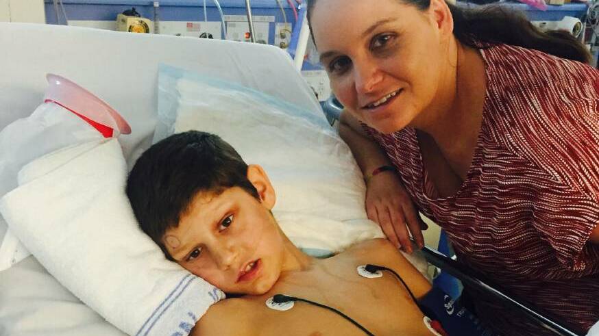 Courageous Caleb: With mum Suzanne at the Sydney Children's Hospital before surgery.
