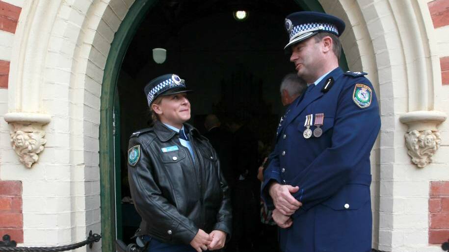 AWARD: Constable Jasmine Lamont is congratulated by Albury Acting Superintendent Evan Quarmby on Thursday. Picture: BLAIR THOMSON