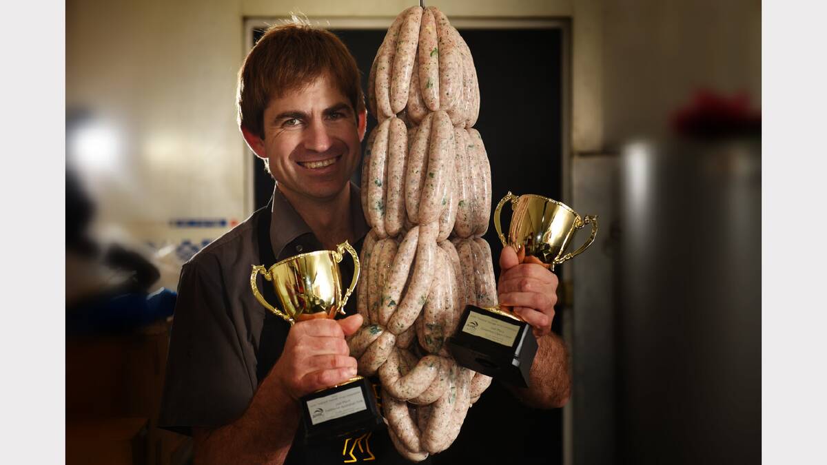 Exeter butcher Nigel Birrell with some of his prize winning sausages. Picture: SCOTT GELSTON