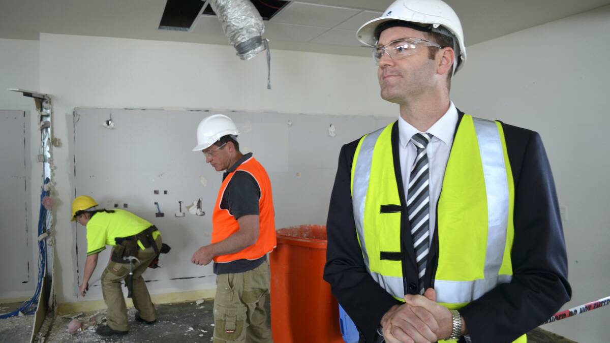 Health Minister Michael Ferguson inspects demolition work at the Royal Hobart Hospital.  Picture: GEORGIE BURGESS
