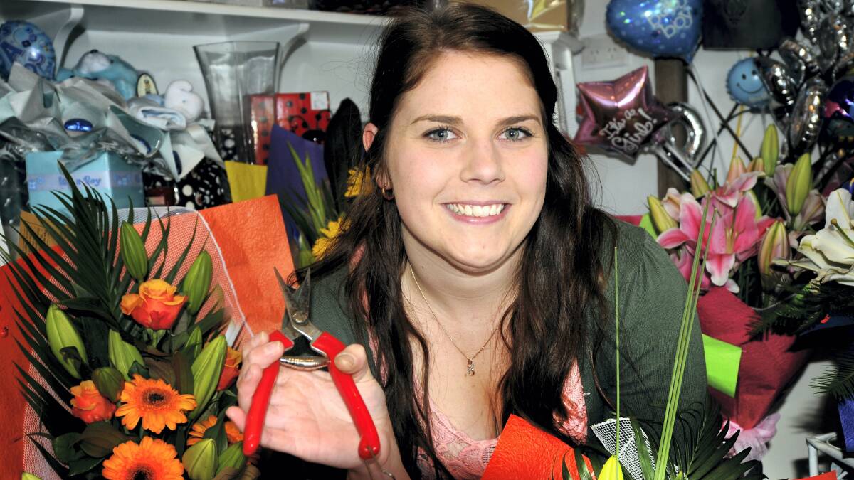 Katherine Howard, of Florist on David, will vie for the Victorian-Tasmanian florist apprentice of the year at the International Melbourne Flower and Garden Show on Saturday.  Picture: GEOFF ROBSON
