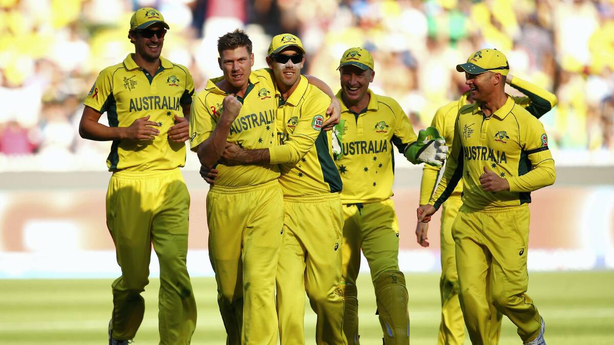 James Faulkner celebrates with teammates after dismissing New Zealand’s Corey Anderson during the 2015 ICC Cricket World Cup final match between Australia and New Zealand at the Melbourne Cricket Ground.  Picture: GETTY IMAGES
