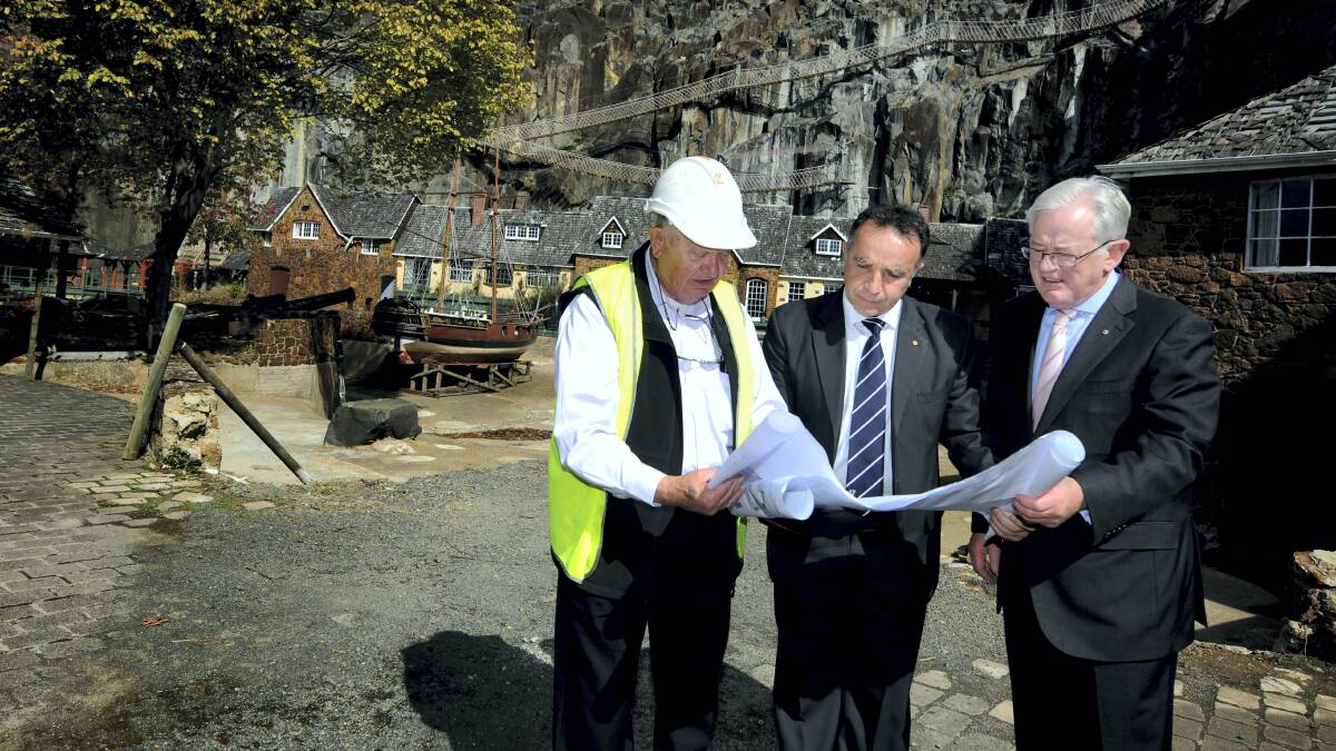 Penny Royal developer Josef Chromy, Bass Liberal MHR Andrew Nikolic and federal Trade and Investment Minister Andrew Robb check out the plans for the site.  Picture: GEOFF ROBSON
