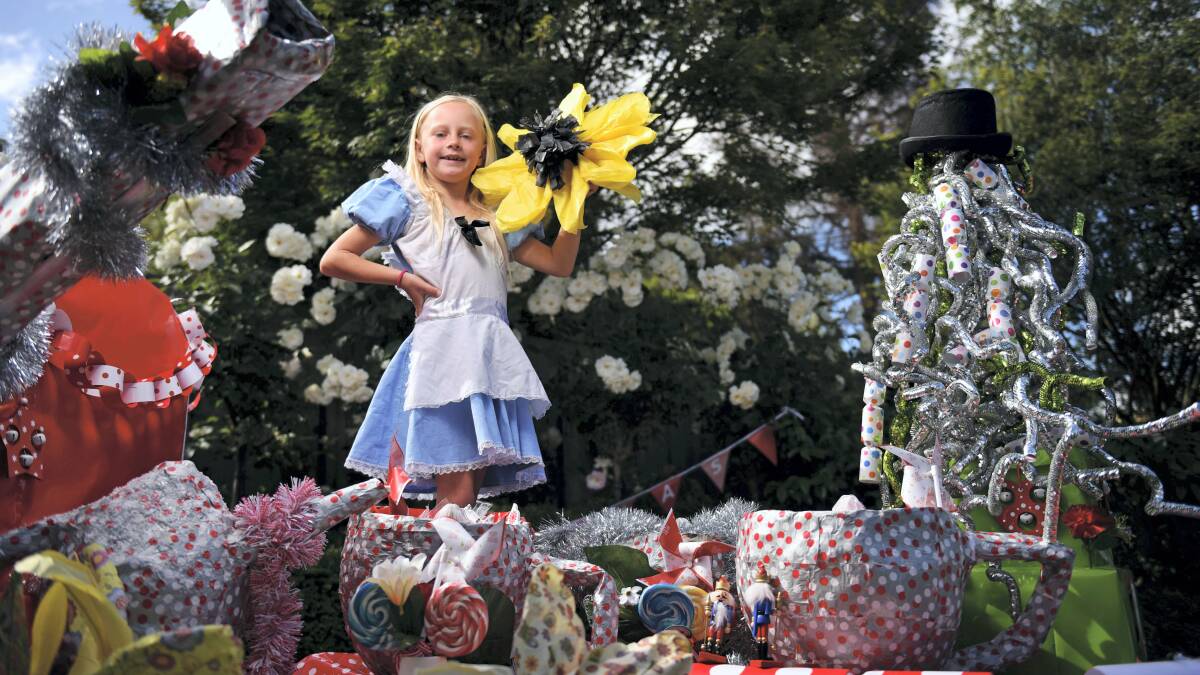 Mackenzie Chiselett, 8, prepares for her role  as Alice in Wonderland on a float for  the Apex Launceston Christmas Parade.  Picture:  SCOTT GELSTON