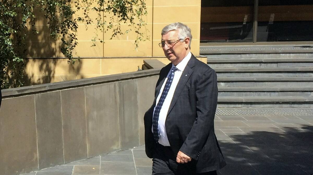 Former Gunns Ltd chairman John Gay leaves the Supreme Court in Hobart on Monday.