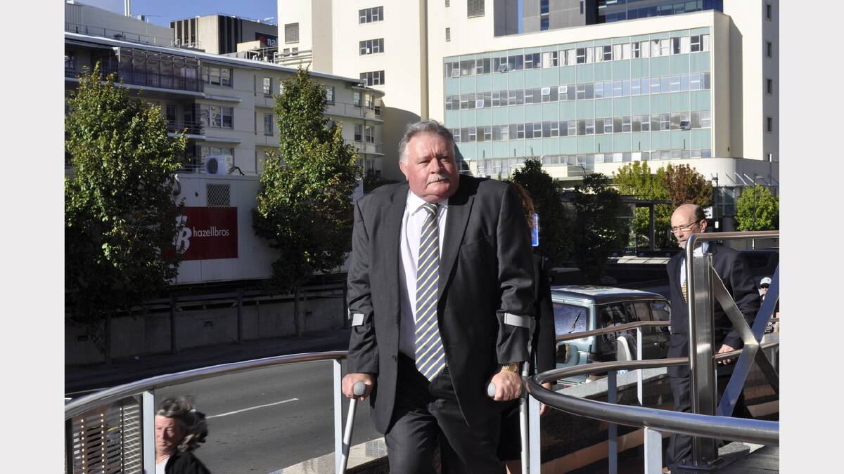 Tim Ellis enters the Hobart Magistrate's Court this morning. Photo: Daniel McCulloch