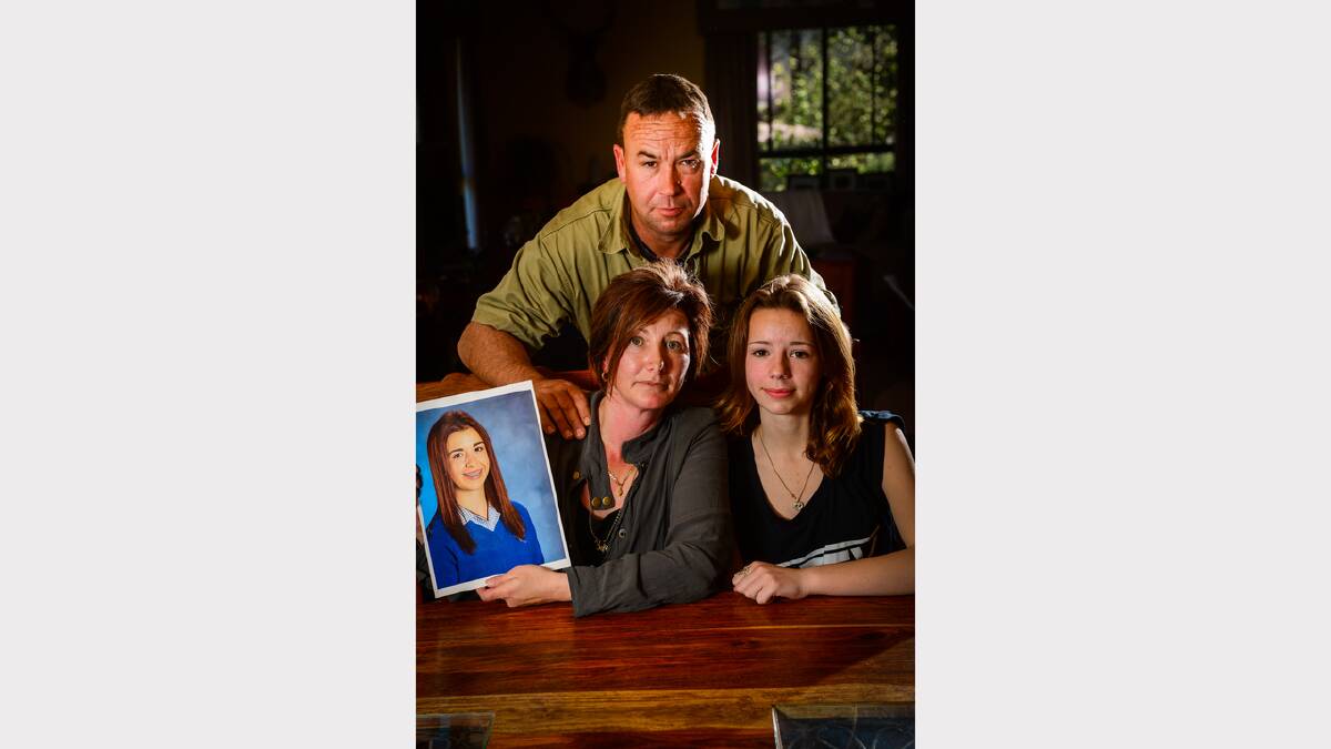 Brittany's parents Lisa and Peter Goss, of Sidmouth, and sister Taylar Picture: PHILLIP BIGGS