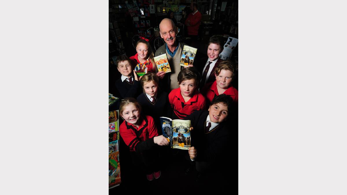 Book signing at Petrach's Bookshop with Scotch Oakburn College and Summerdale Primary School pupils, Jessica Turner, Geremie Antypas, Jessica McCallumSmith, Spencer Hayes, Nicholas Mayne, Abraham Scott, Jordyn Hayes and Williams Scott with author Justin D'Ath. Picture: PHILLIP BIGGS