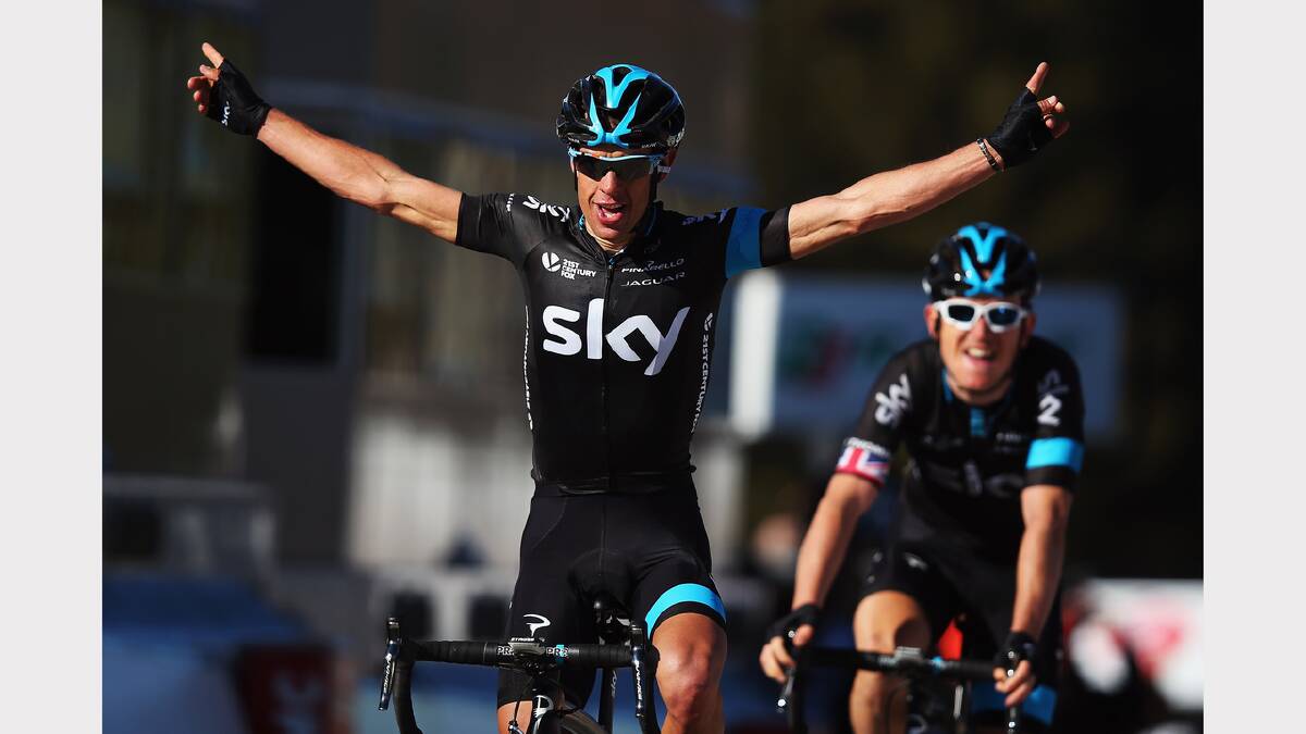 Tasmanian Richie Porte, of Team SKY, celebrates winning ahead of team mate Geriant Thomas of Great Britain on stage four o 2015 Paris-Nice from Varennes-sur-Allier to Croix de Chaubouret, France.  (Photo by Bryn Lennon/Getty Images)