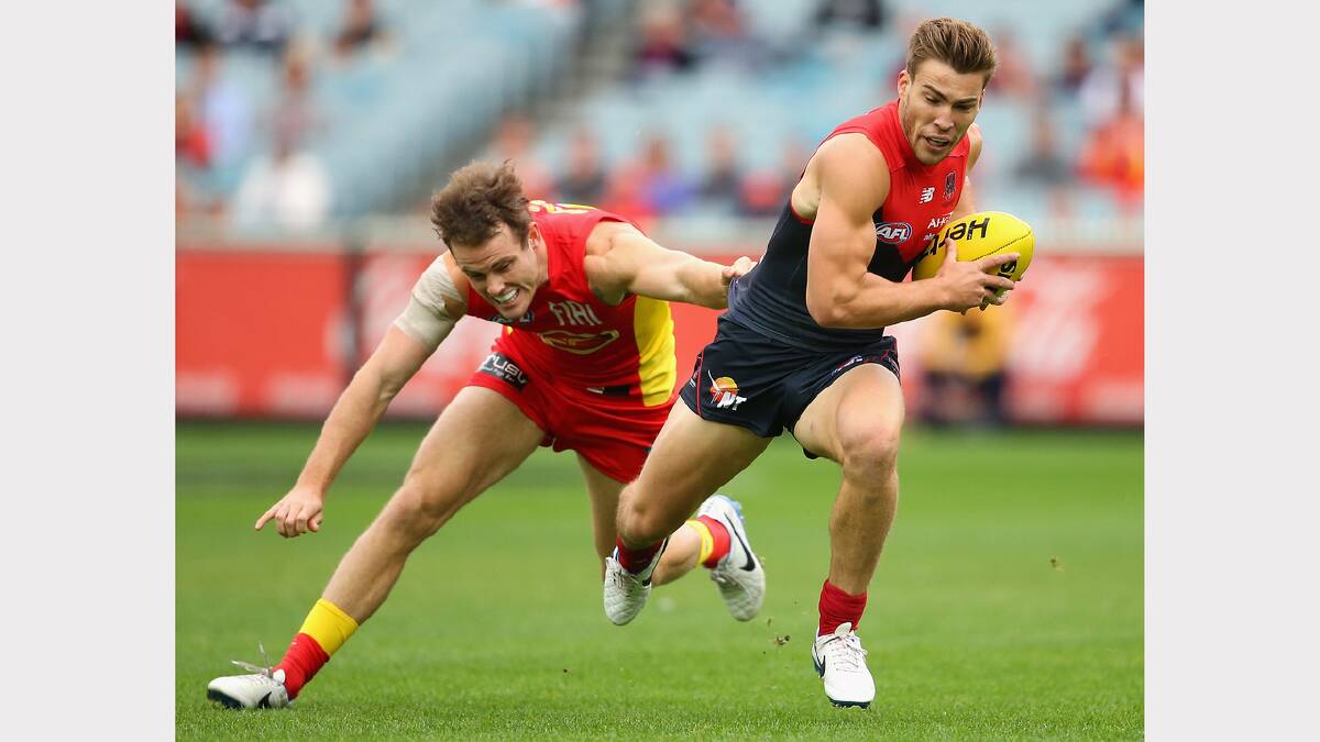 Melbourne's Jack Viney in action against the Suns earlier this season. Photo by Getty Images
