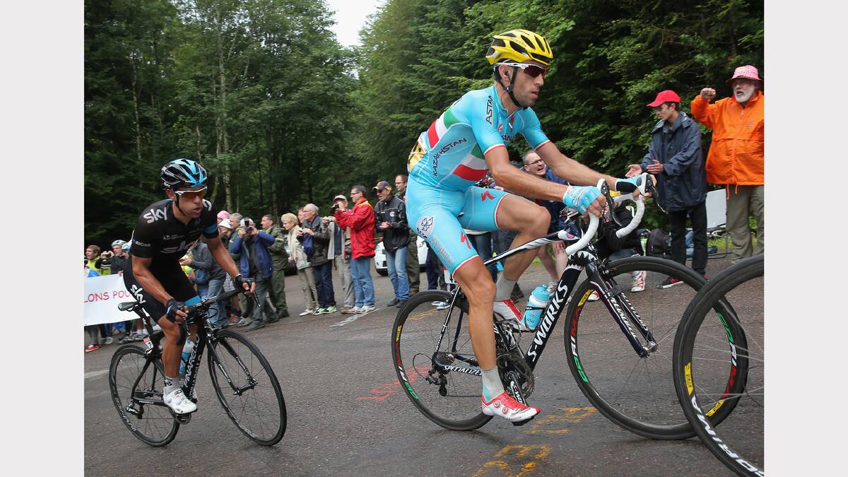Richie Porte of Australia and Team Sky follows the wheel of Vincenzo Nibali of Italy and the Astana Pro Team in the climb of the Col des Chevreres during stage ten of the 2014 Le Tour de France from Mulhouse to La Planche des Belles Filles. Photo: Getty Images