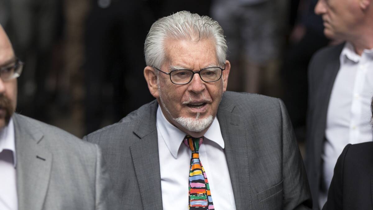 Artist and television personality Rolf Harris arrives at Southwark Crown Court to face sentencing on 12 counts of indecent assault  (Photo by Oli Scarff/Getty Images)
