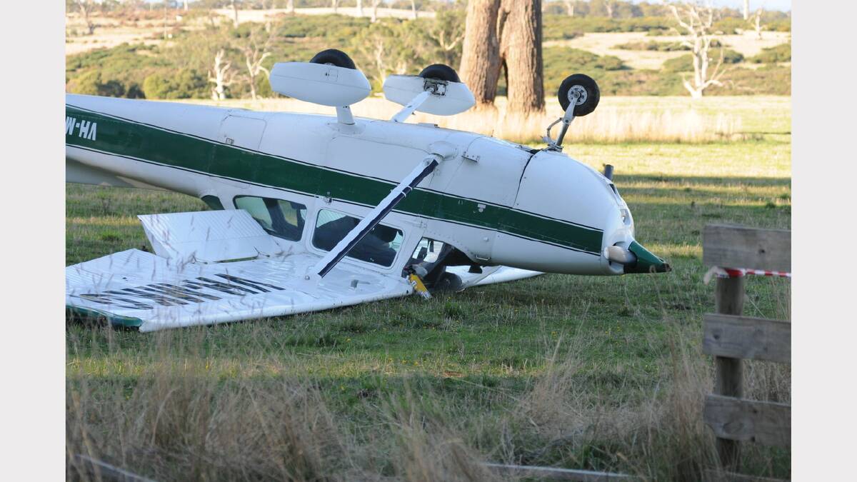 The upturned Cessna at Agfest this afternoon. Photo by Geoff Robson