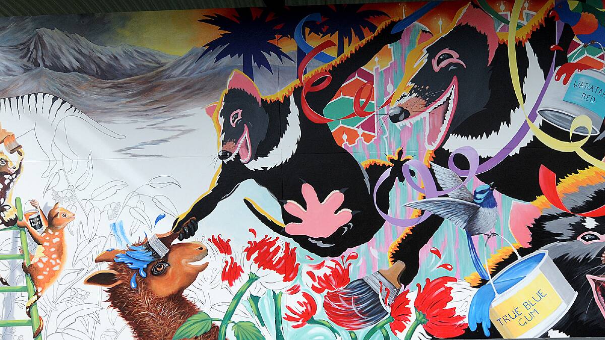 Then and Now: A celebration has won the 2014 International Mural Fest. Picture: GEOFF ROBSON.
