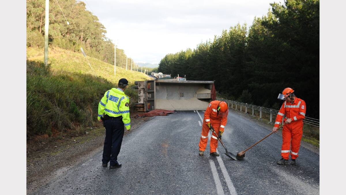 Police and SES workers at the Railton scene today.