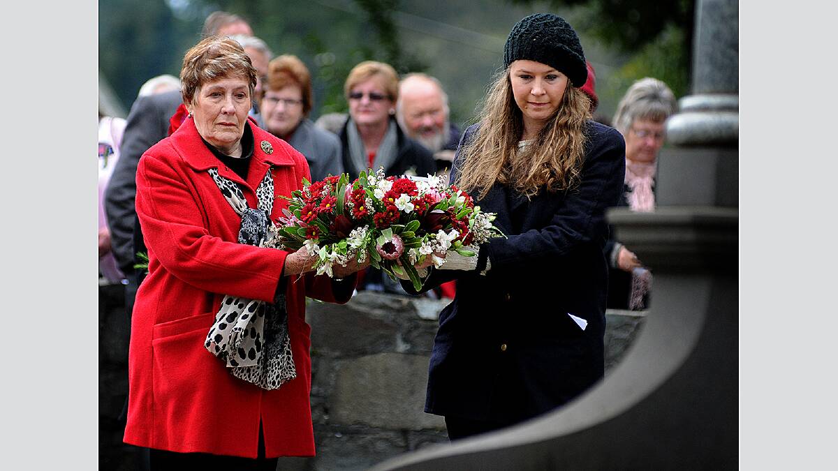 Meander Valley residents brave the cold to pay their respects at Deloraine today. Picture: GEOFF ROBSON.