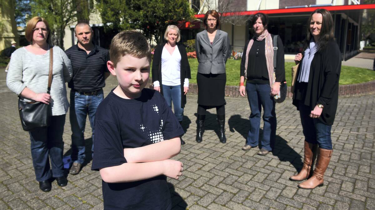 Gina and Ben Cunningham, of Launceston, with son Brayden, 10,  Trudi Hogg, of Legana, Kristen Desmond, of Tas Disability Education Reform, Jenni-Lee Ranginui, of Invermay, and Michelle Horder, of Summerhill. Picture: PAUL SCAMBLER
