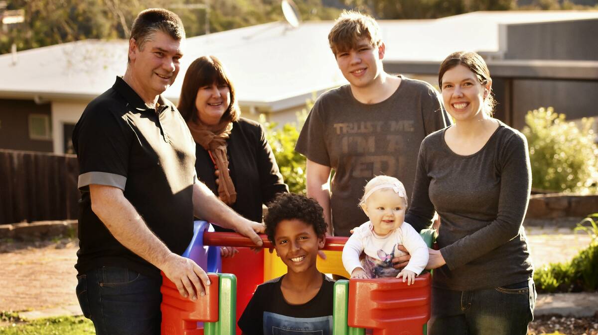 Craig Spaulding with his wife, Louise, sons Bini, 9, and Sam, 17, daughter Sarah Loft and granddaughter Nadine Loft, 9 months.  Picture: SCOTT GELSTON
