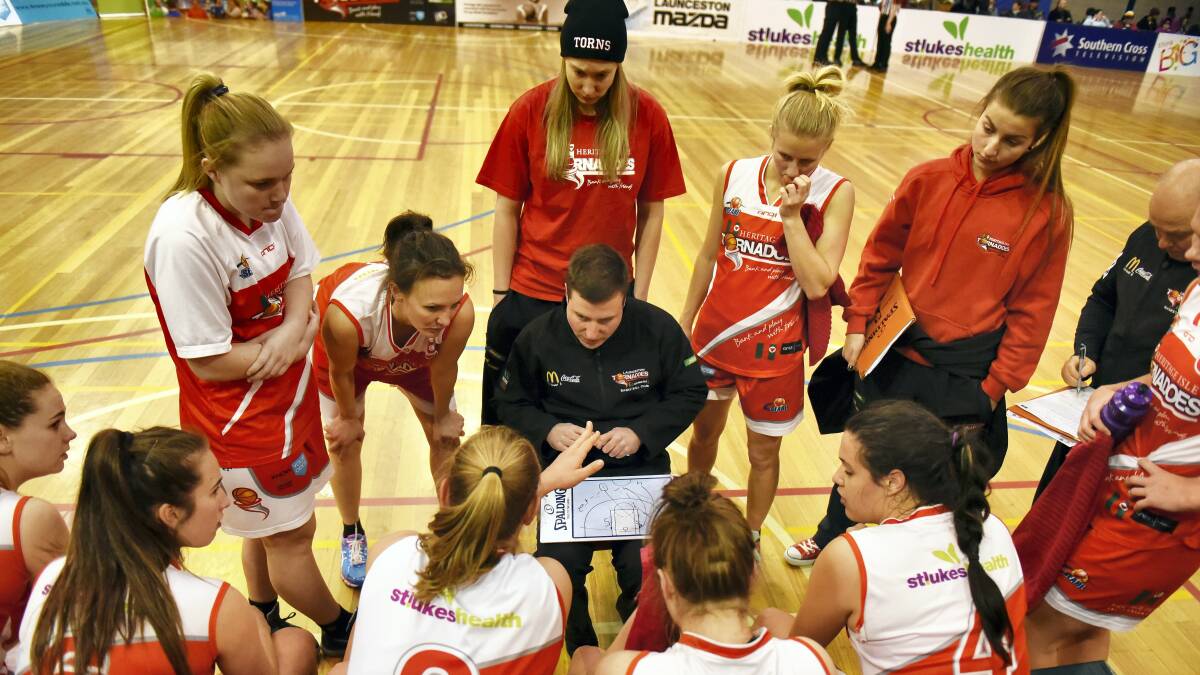 Launceston Tornadoes  coach Reece Potter talks tactics to his team. The Torns can guarantee themselves a place in the play-offs with a win over Nundawading in Melbourne on Saturday. Picture: SCOTT GELSTON