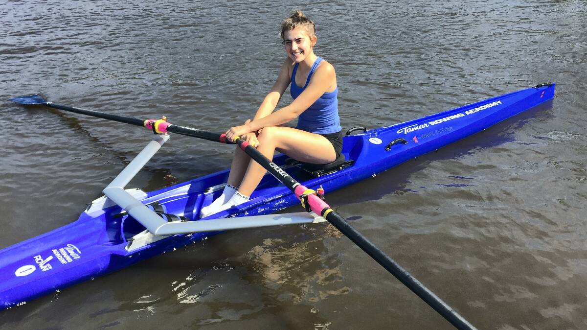 Tamar Rowing Academy participant Shinae Auric dips her oars in the water. The Tamar Rowing Club has bought six state-of-the-art training single sculls.