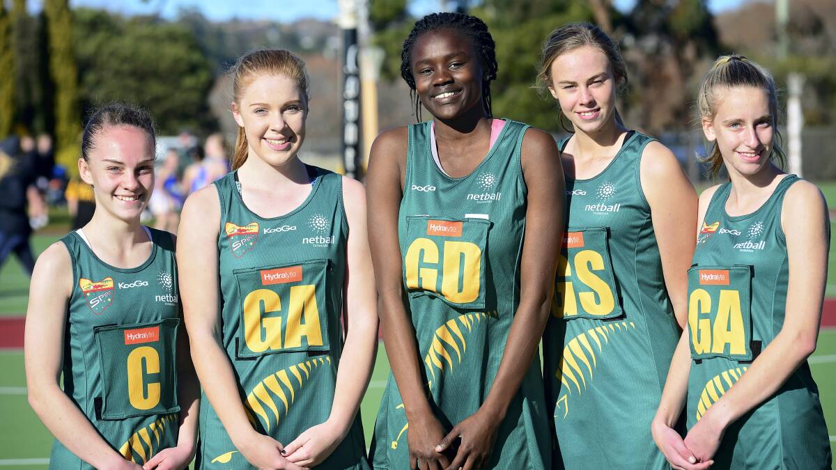Tasmanian under-15 state netball players Lace McHugh, Nadia Donnelly, Magdalia Koko, Courtney Treloar and Erin Percy. Picture: PHILLIP BIGGS