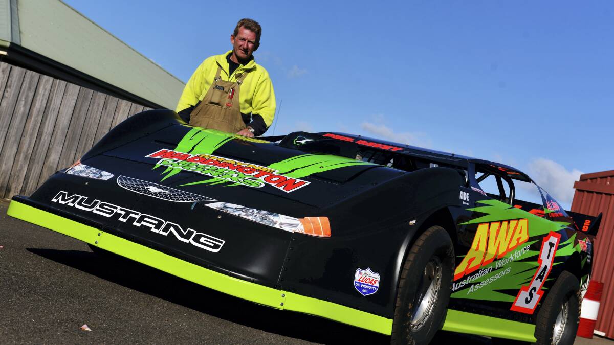 Launceston’s Dave Nichols with his Mustang super sedan. The reigning champion is seeking another state title.  Picture: SCOTT GELSTON